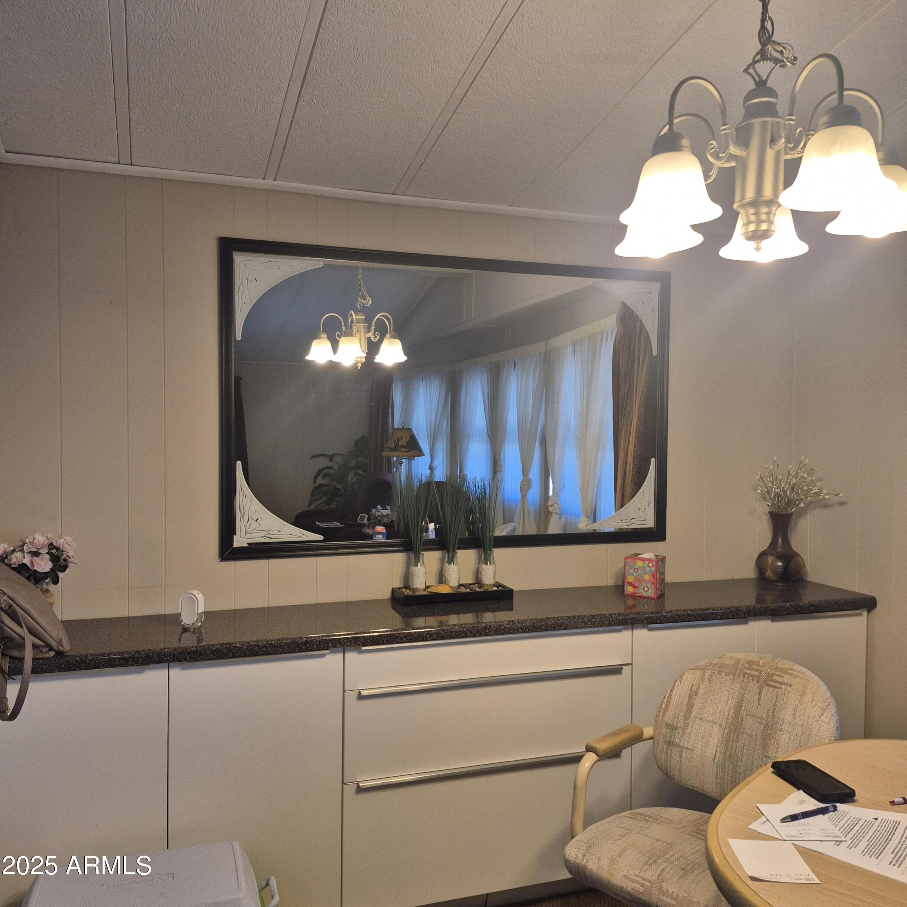 661 South Hawes Road, Unit 25 Mesa, AZ 85208 - Photo 25 of 50 a bathroom with a sink and a mirror