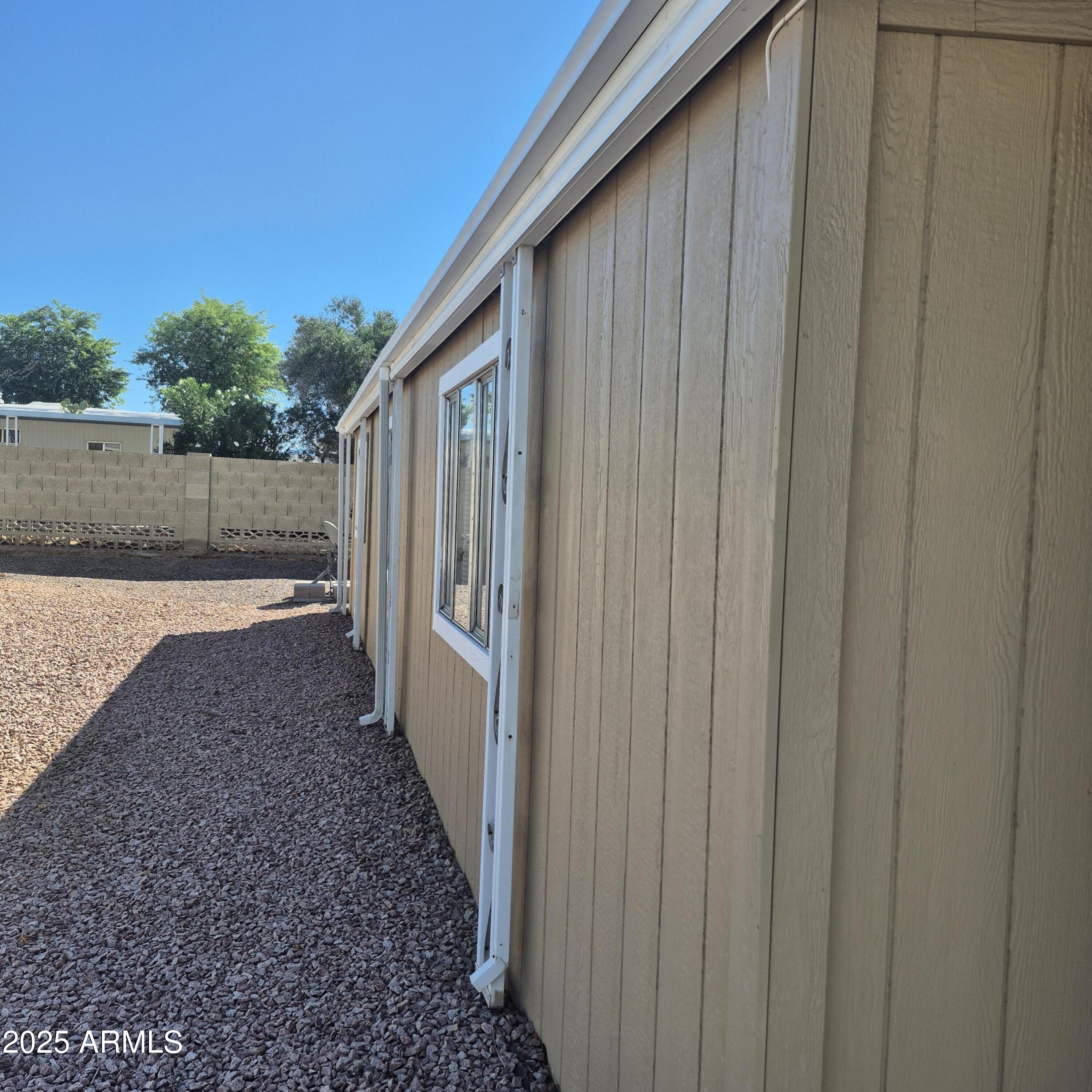661 South Hawes Road, Unit 25 Mesa, AZ 85208 - Photo 38 of 50 a view of a backyard