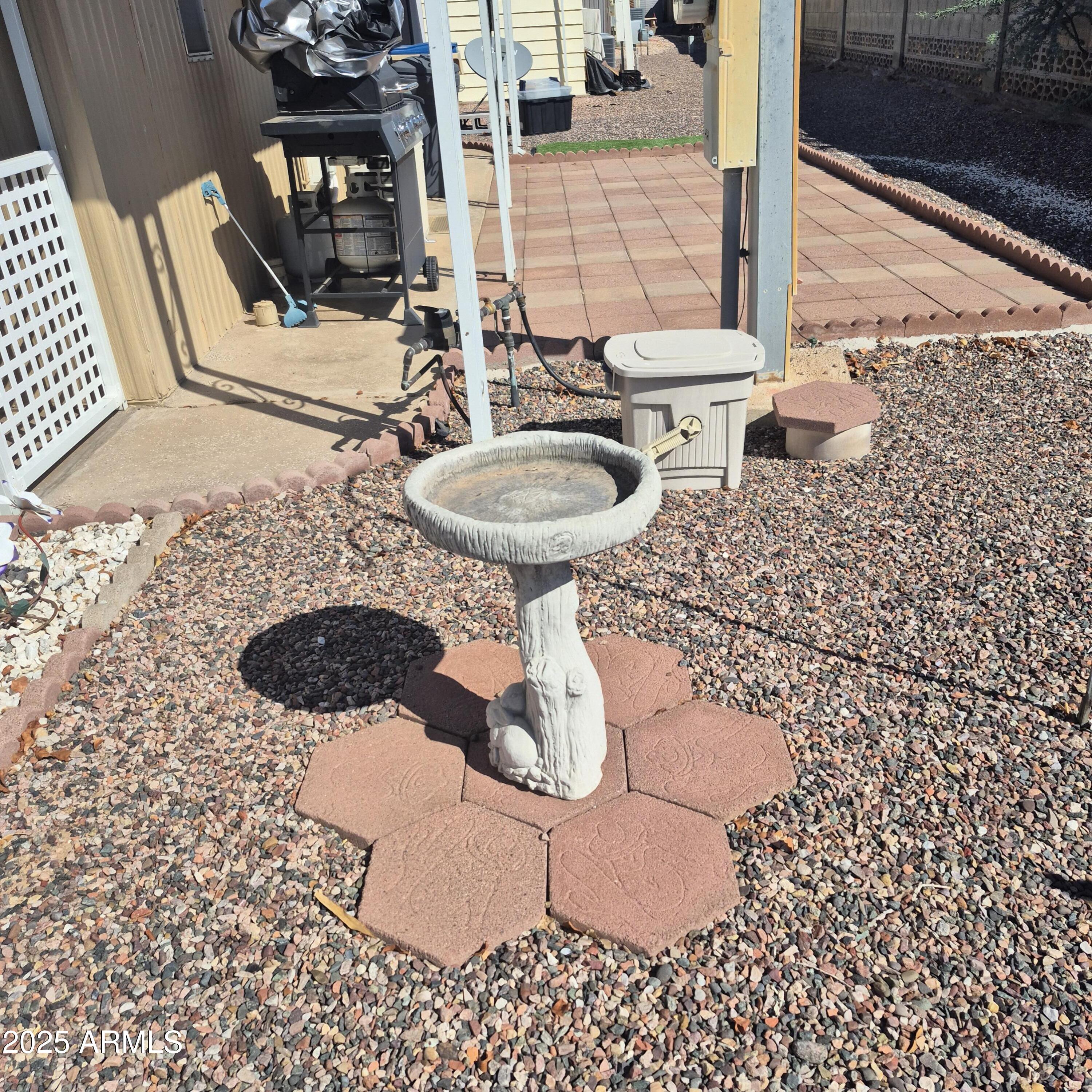 661 South Hawes Road, Unit 25 Mesa, AZ 85208 - Photo 40 of 50 a bathroom with a sink toilet and mirror