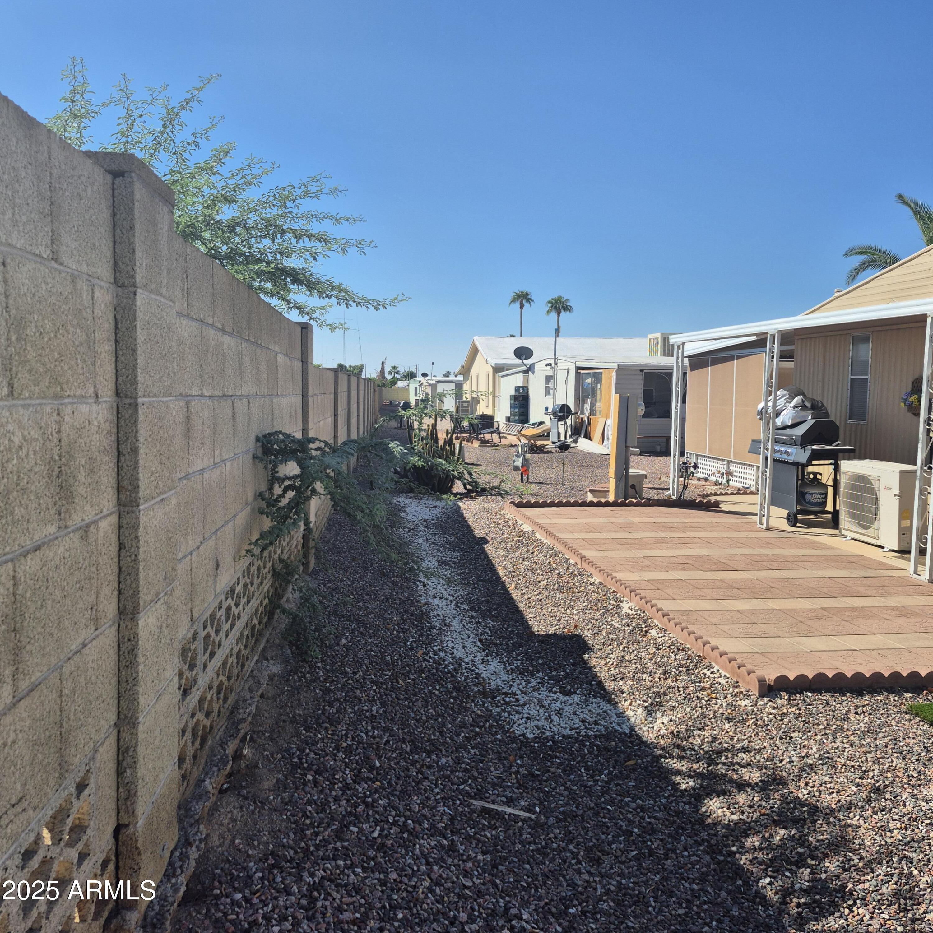 661 South Hawes Road, Unit 25 Mesa, AZ 85208 - Photo 46 of 50 a view of a backyard