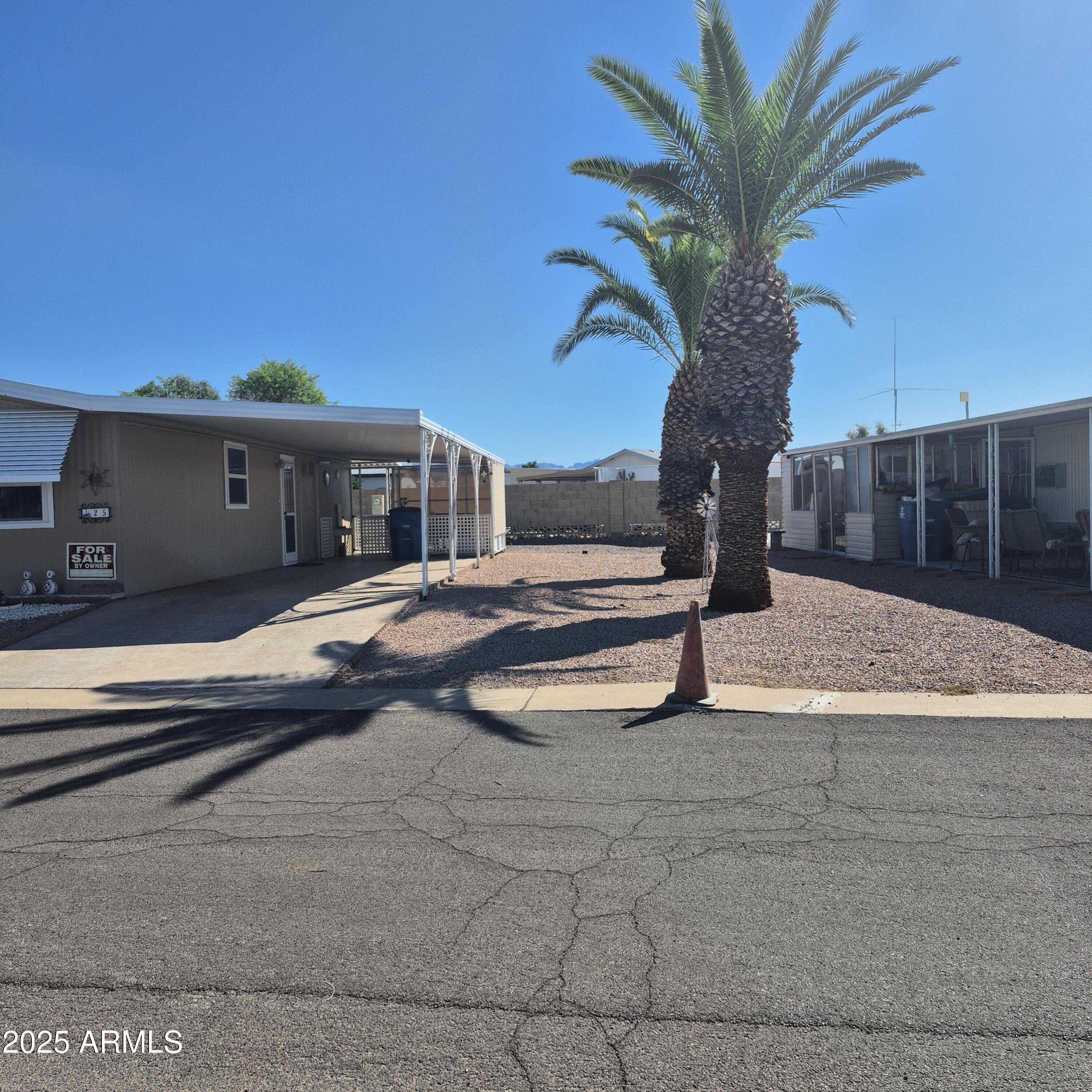 661 South Hawes Road, Unit 25 Mesa, AZ 85208 - Photo 5 of 50 a view of swimming pool with a yard