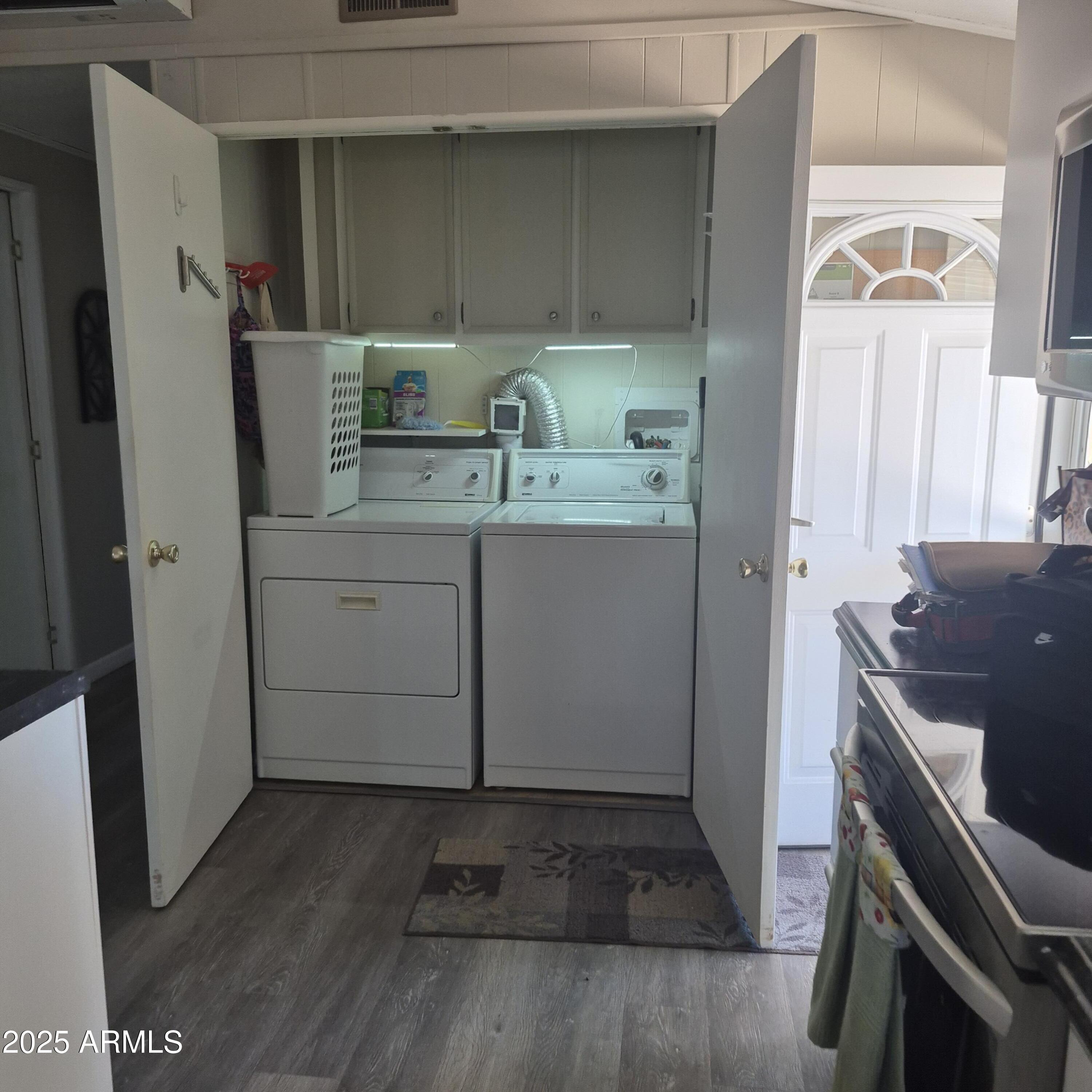 661 South Hawes Road, Unit 25 Mesa, AZ 85208 - Photo 9 of 50 a room with storage and utility