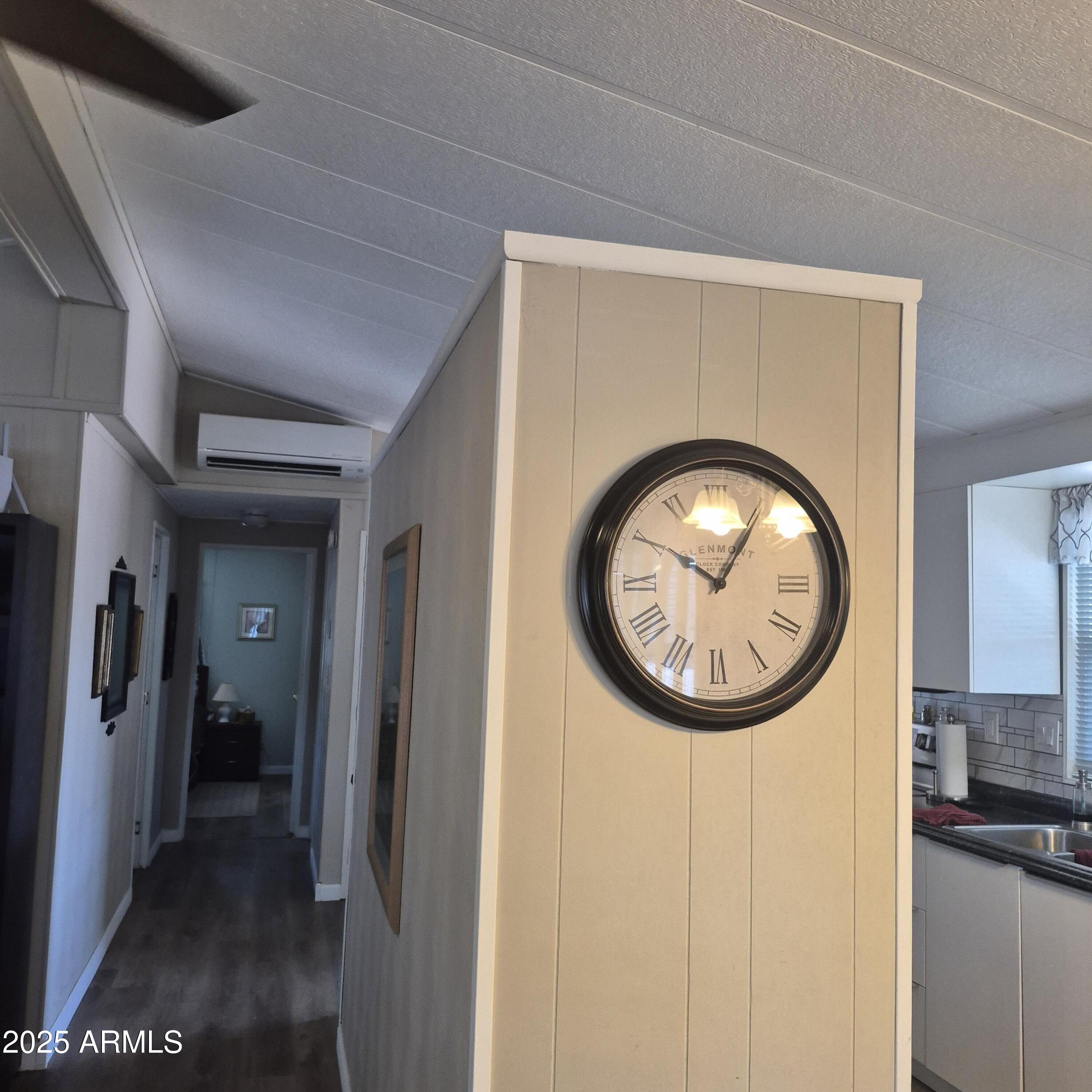 661 South Hawes Road, Unit 25 Mesa, AZ 85208 - Photo 10 of 50 a view of a hallway with a washer and dryer