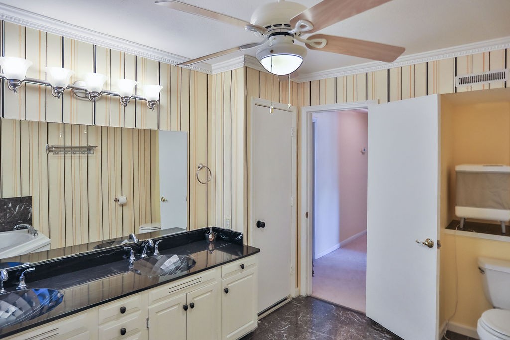 305 Myers Terrace Carthage, TN 37030 - Photo 23 of 75 a bathroom with a granite countertop sink and a mirror