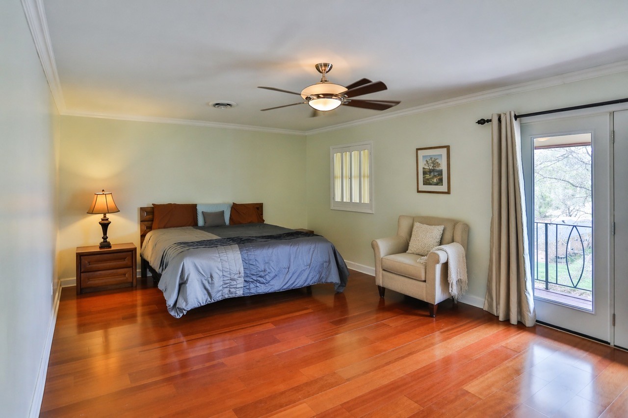 305 Myers Terrace Carthage, TN 37030 - Photo 25 of 75 a bedroom with a bed and wooden floor