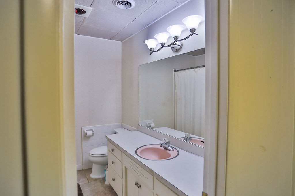 305 Myers Terrace Carthage, TN 37030 - Photo 52 of 75 a bathroom with a sink a toilet and a mirror