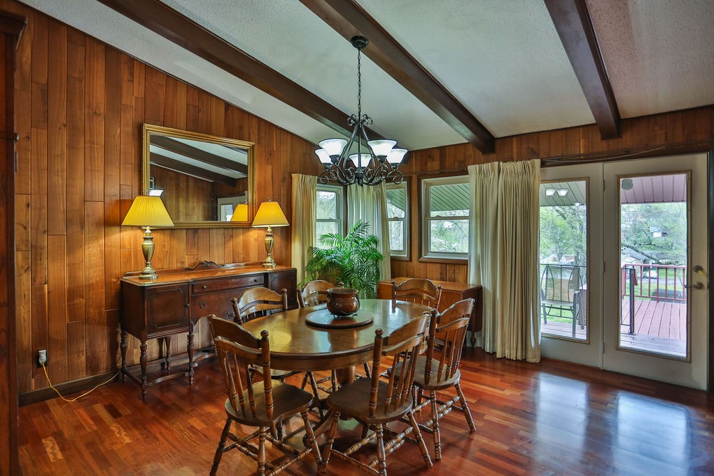 305 Myers Terrace Carthage, TN 37030 - Photo 10 of 75 a dining room with furniture a chandelier and wooden floor