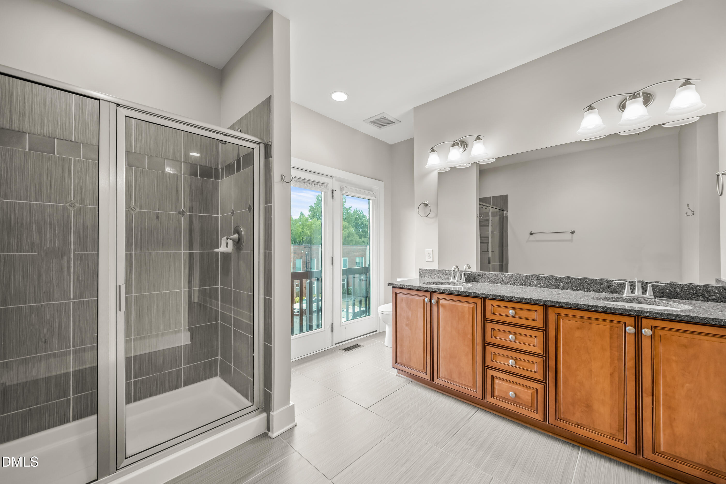 530 John Haywood Way, Unit 104 Raleigh, NC 27604 - Photo 20 of 29 530-104 JHW Primary Bathroom - 1