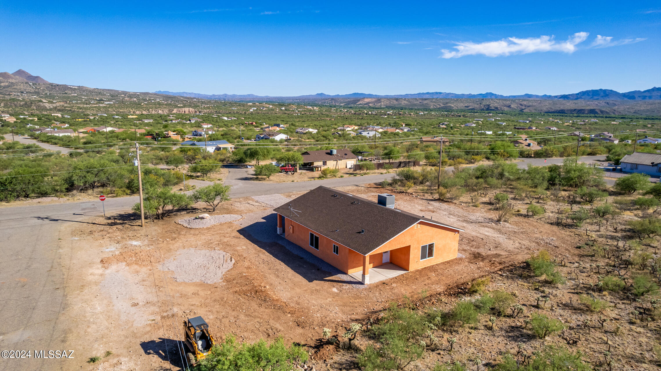 91 Avenida De Las Naciones Rio Rico, AZ 85648 - Photo 29 of 36 an aerial view of a house with a mountain
