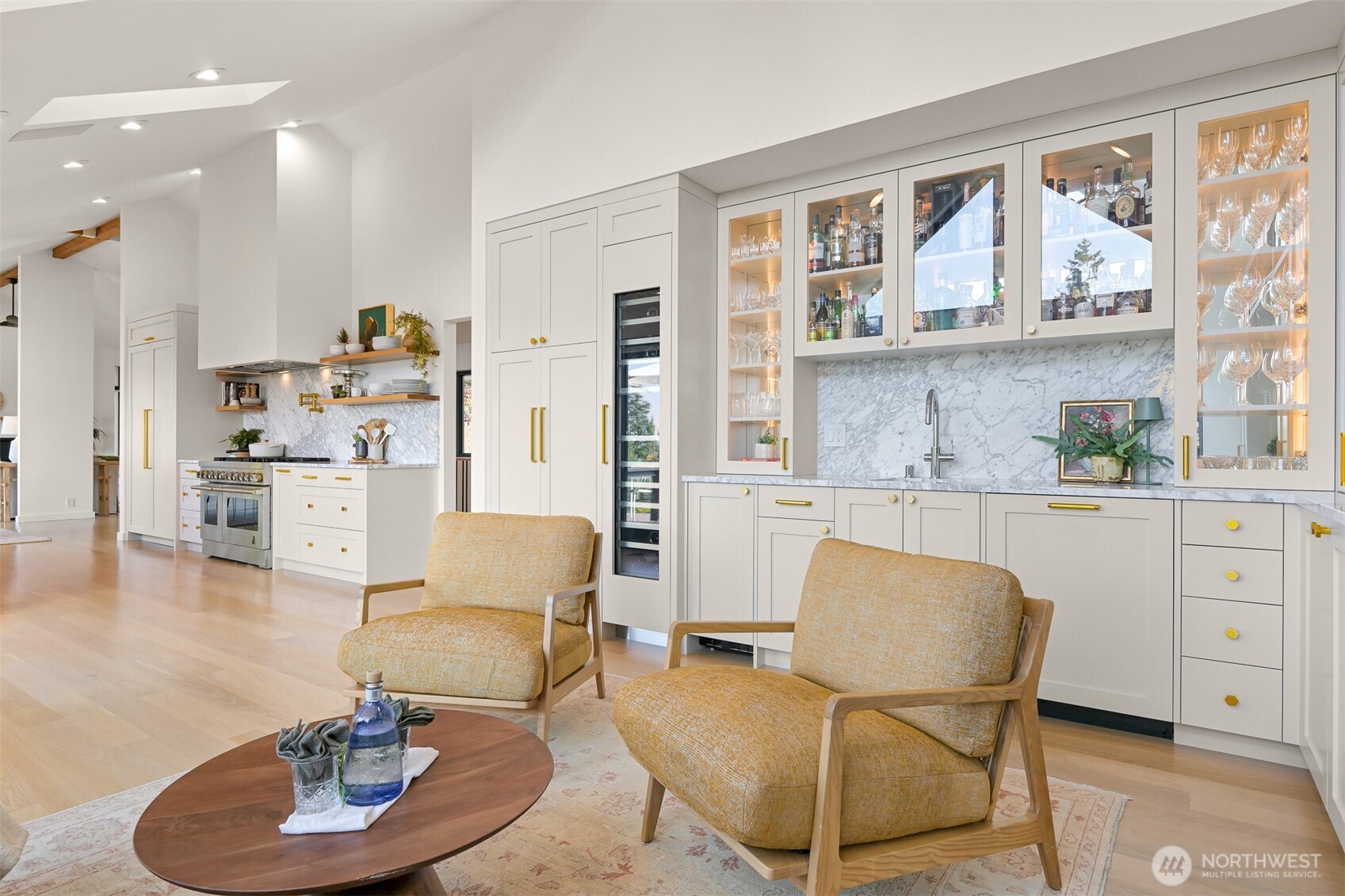 405 Bayside Road Bellingham, WA 98225 - Photo 16 of 40 a living room with furniture and a kitchen