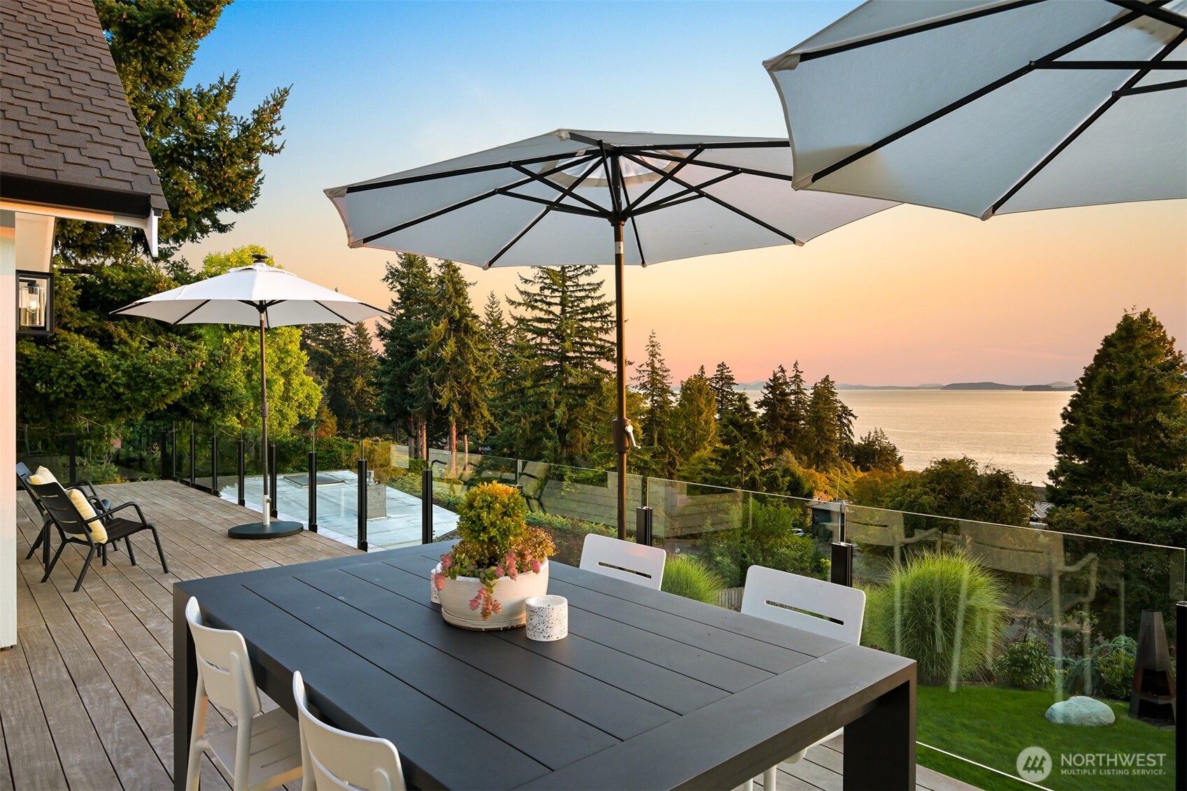 405 Bayside Road Bellingham, WA 98225 - Photo 20 of 40 a view of deck with furniture and a table