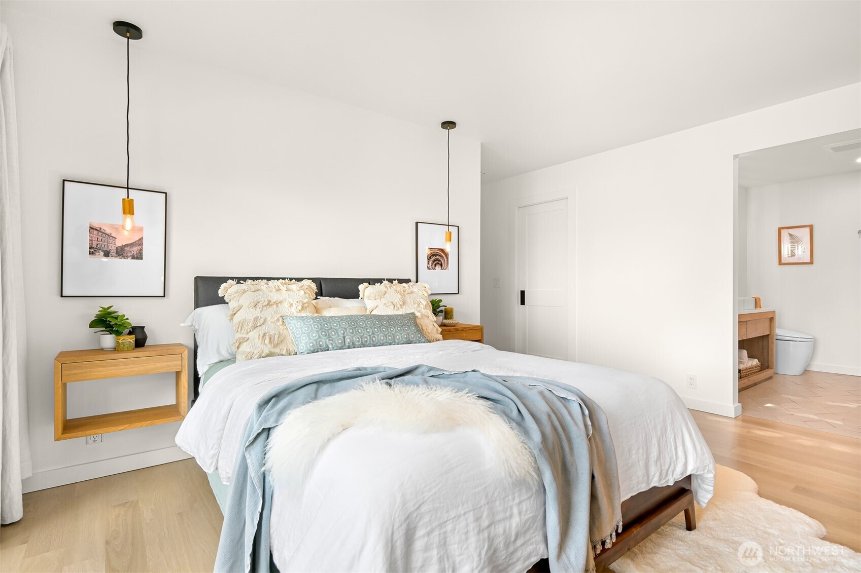 405 Bayside Road Bellingham, WA 98225 - Photo 22 of 40 a bedroom with bed and painting on the wall