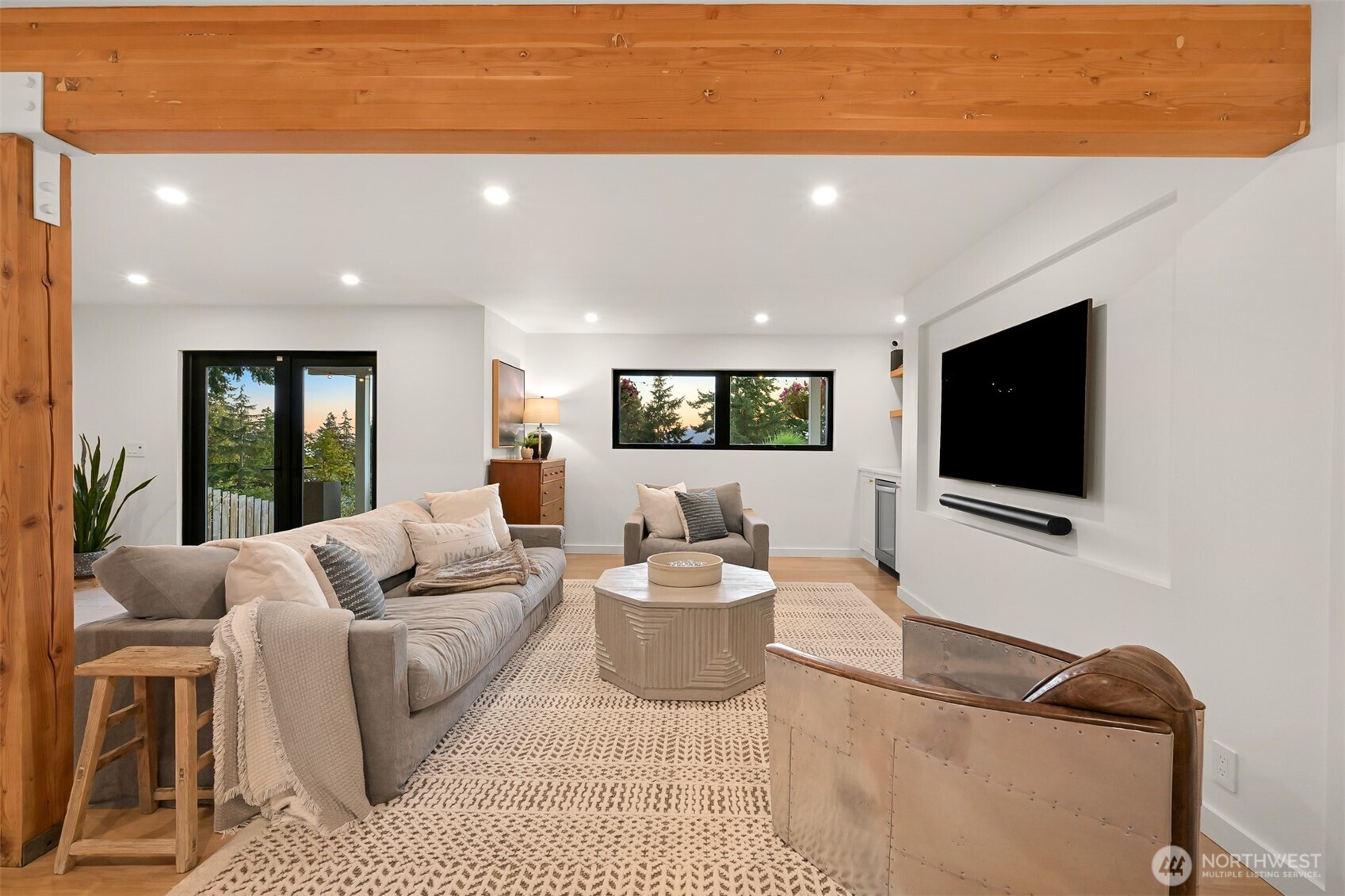 405 Bayside Road Bellingham, WA 98225 - Photo 29 of 40 a living room with furniture and a flat screen tv