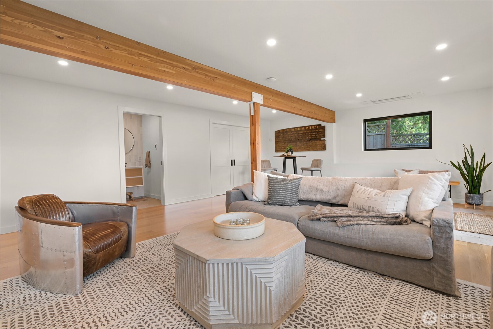 405 Bayside Road Bellingham, WA 98225 - Photo 30 of 40 a living room with furniture and a wooden floor