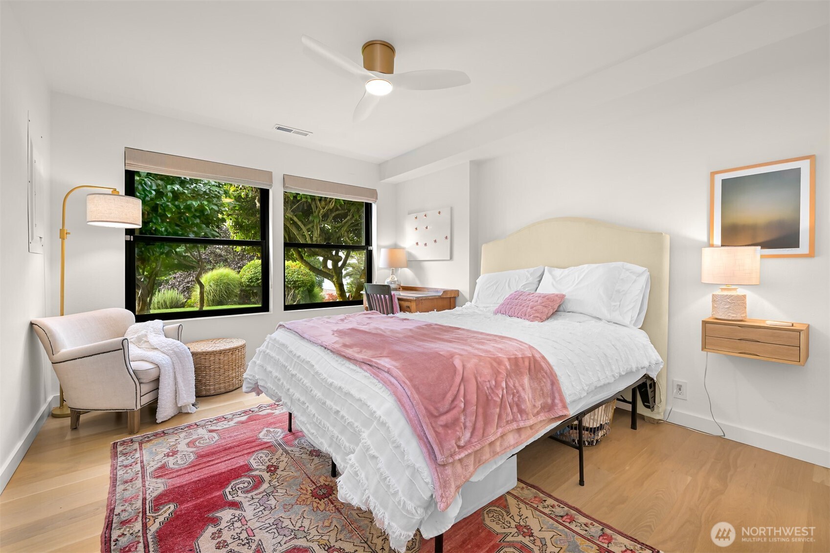 405 Bayside Road Bellingham, WA 98225 - Photo 33 of 40 a bedroom with a bed and a large window