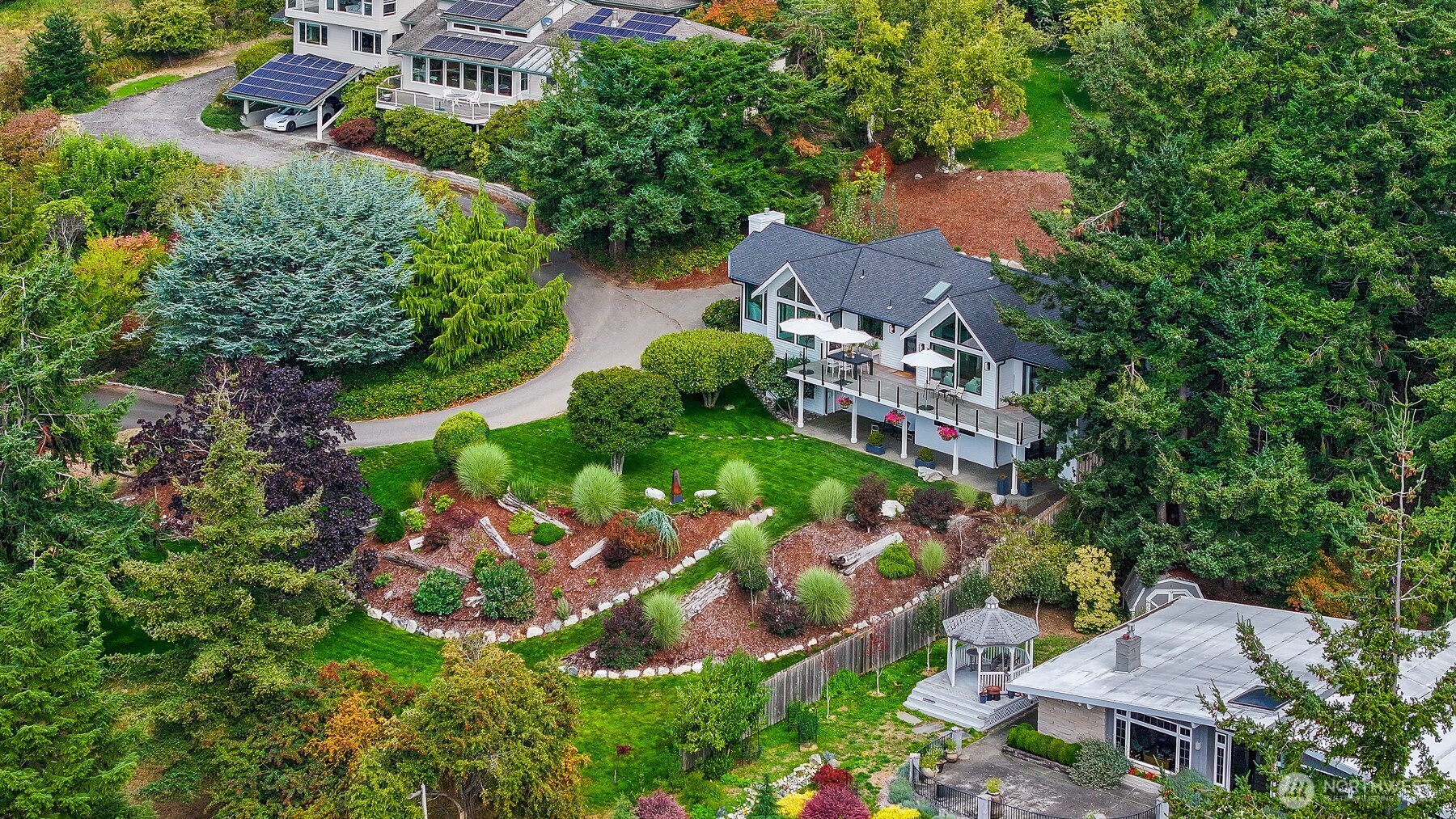 405 Bayside Road Bellingham, WA 98225 - Photo 4 of 40 an aerial view of a house with yard swimming pool and outdoor seating