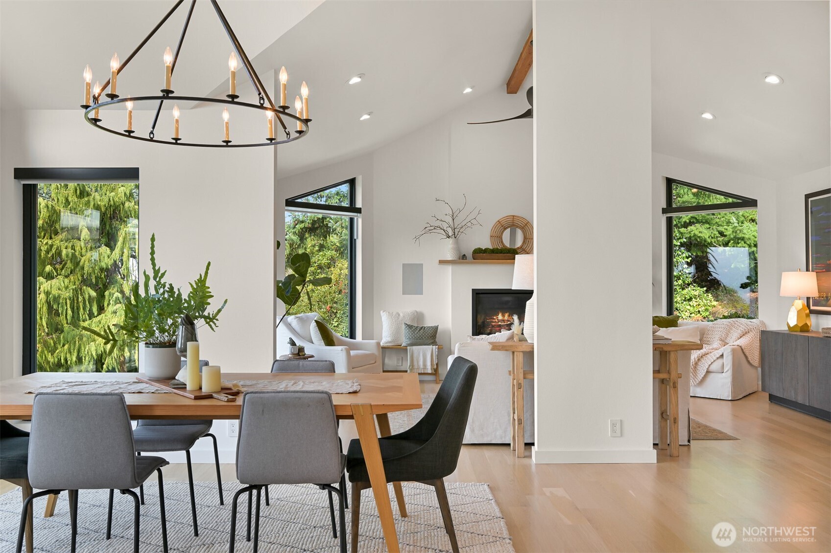 405 Bayside Road Bellingham, WA 98225 - Photo 7 of 40 a dining room with furniture a window and a chandelier