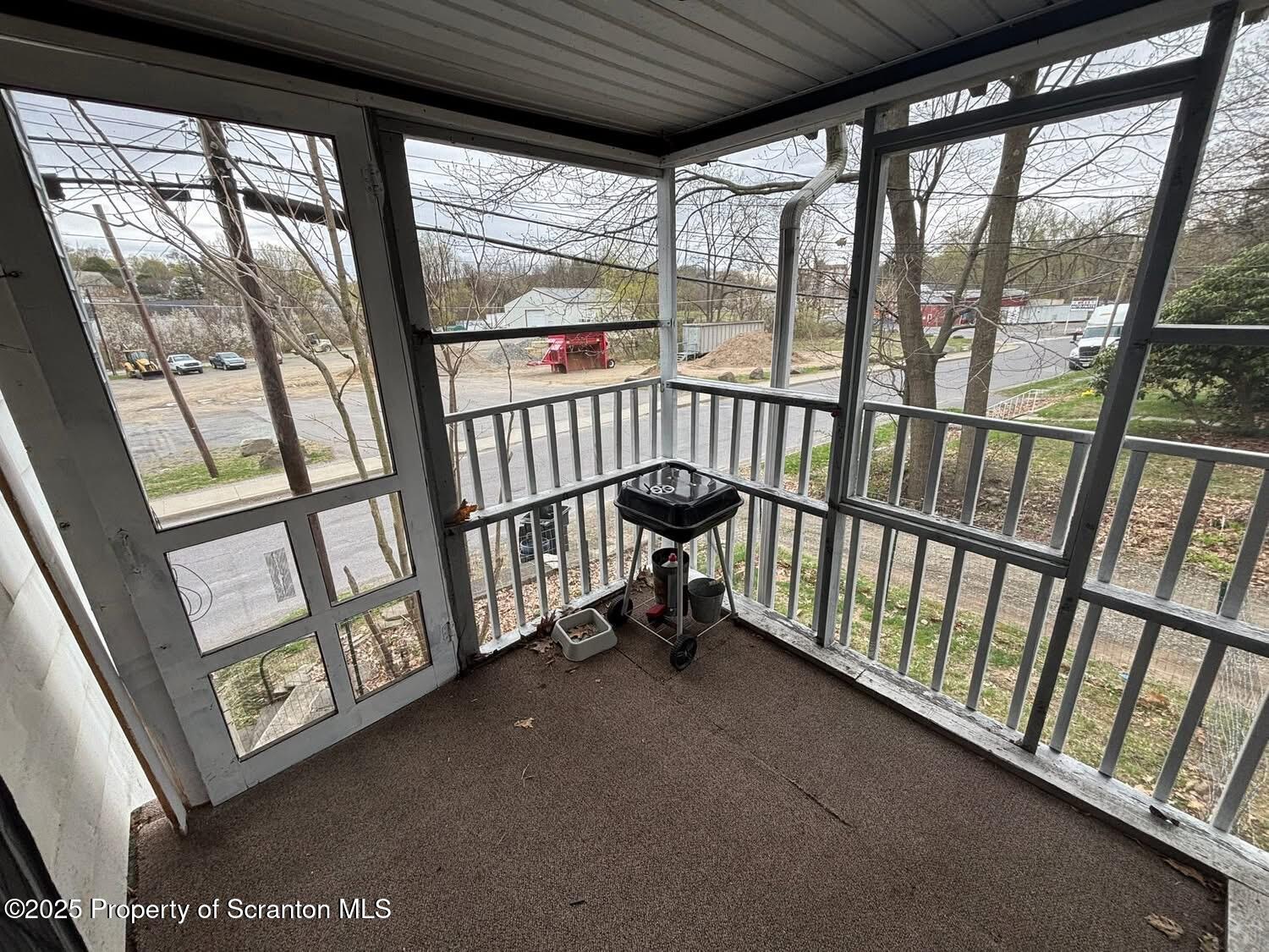 210 Center Street, Unit 2 Clarks Summit, PA 18411 - Photo 12 of 14 a view of staircase with large window