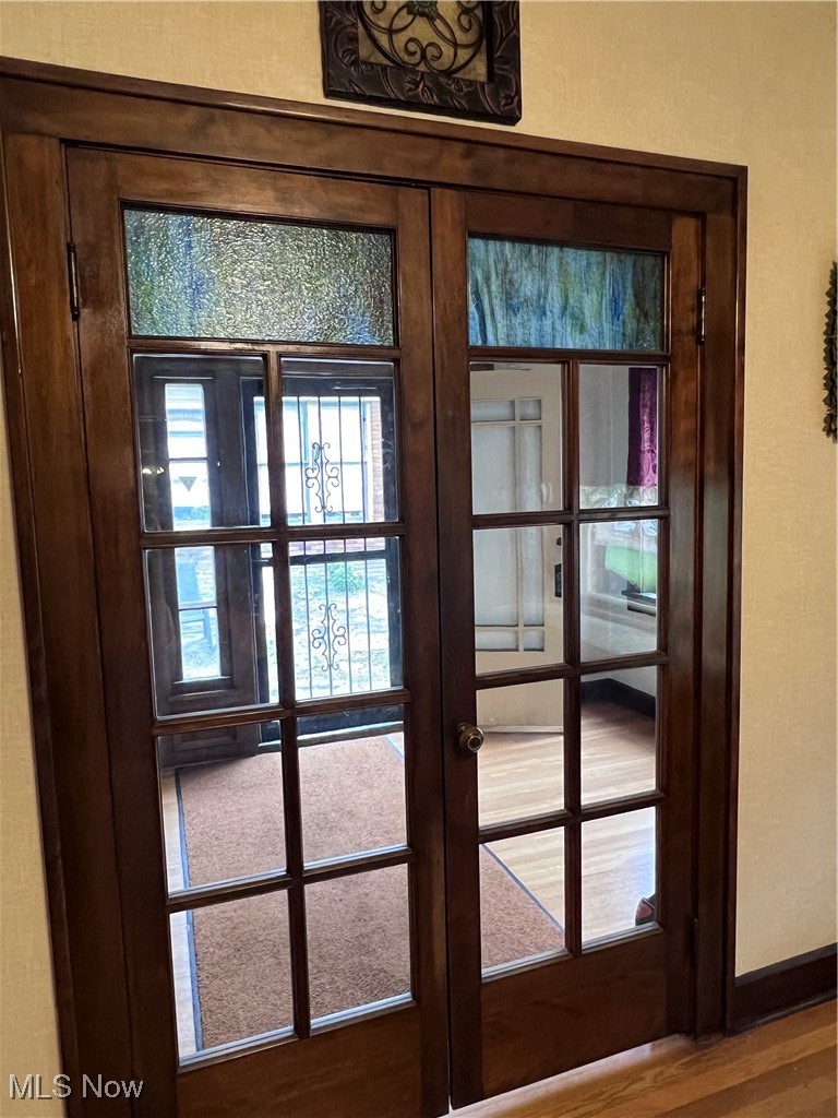 4581 Pearl Road Cleveland, OH 44109 - Photo 3 of 36 Detailed view of french doors and wood finished floors