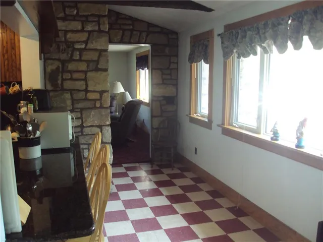 a view of a workspace with furniture