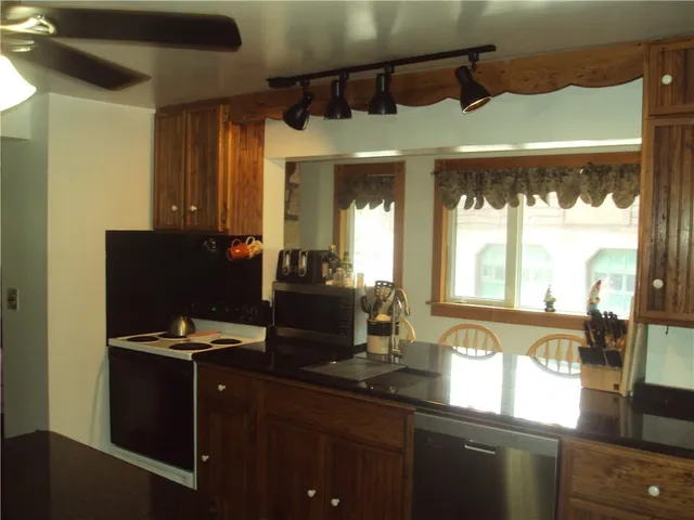 a outdoor living space with furniture and a potted plant