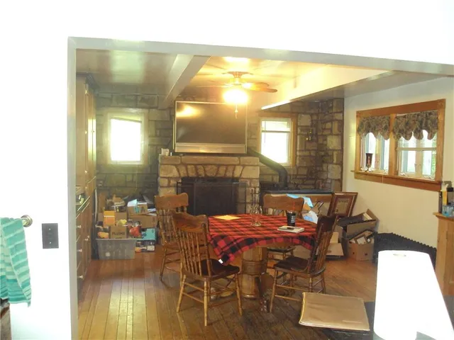 a view of a entryway with furniture and a window