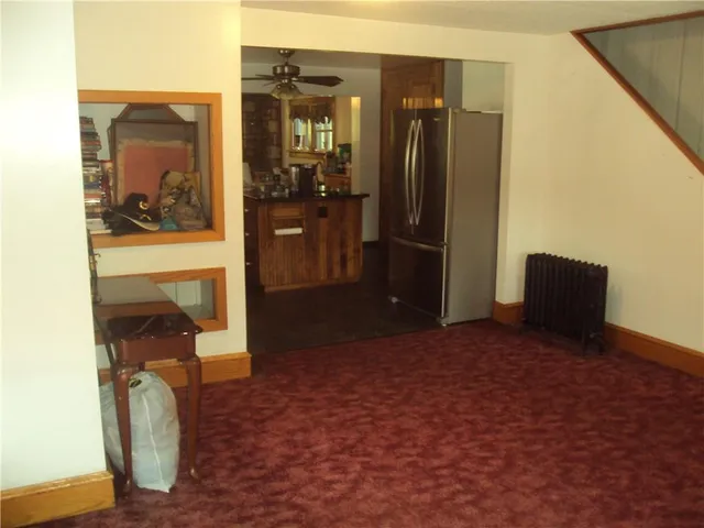 a view of balcony with wooden floor