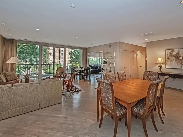 a dining room with furniture window wooden floor