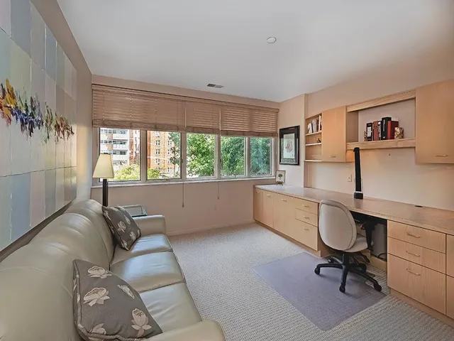 a view of balcony with furniture