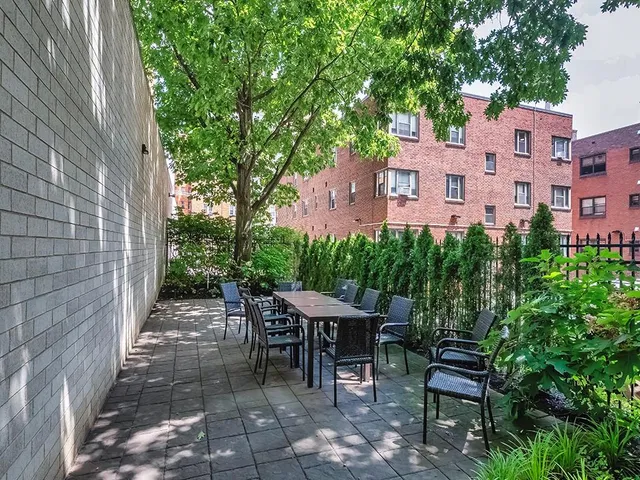 a vase of flowers sitting on a table