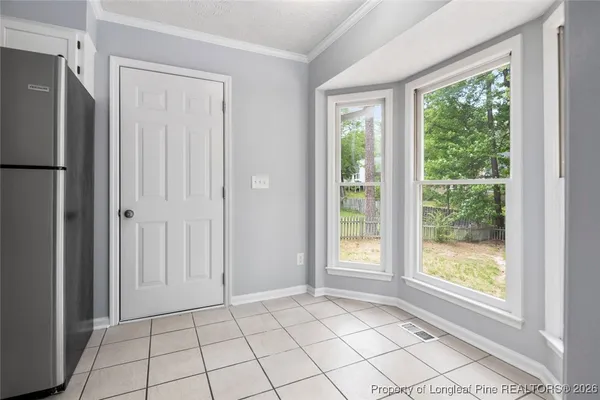 a view of an entryway with a window