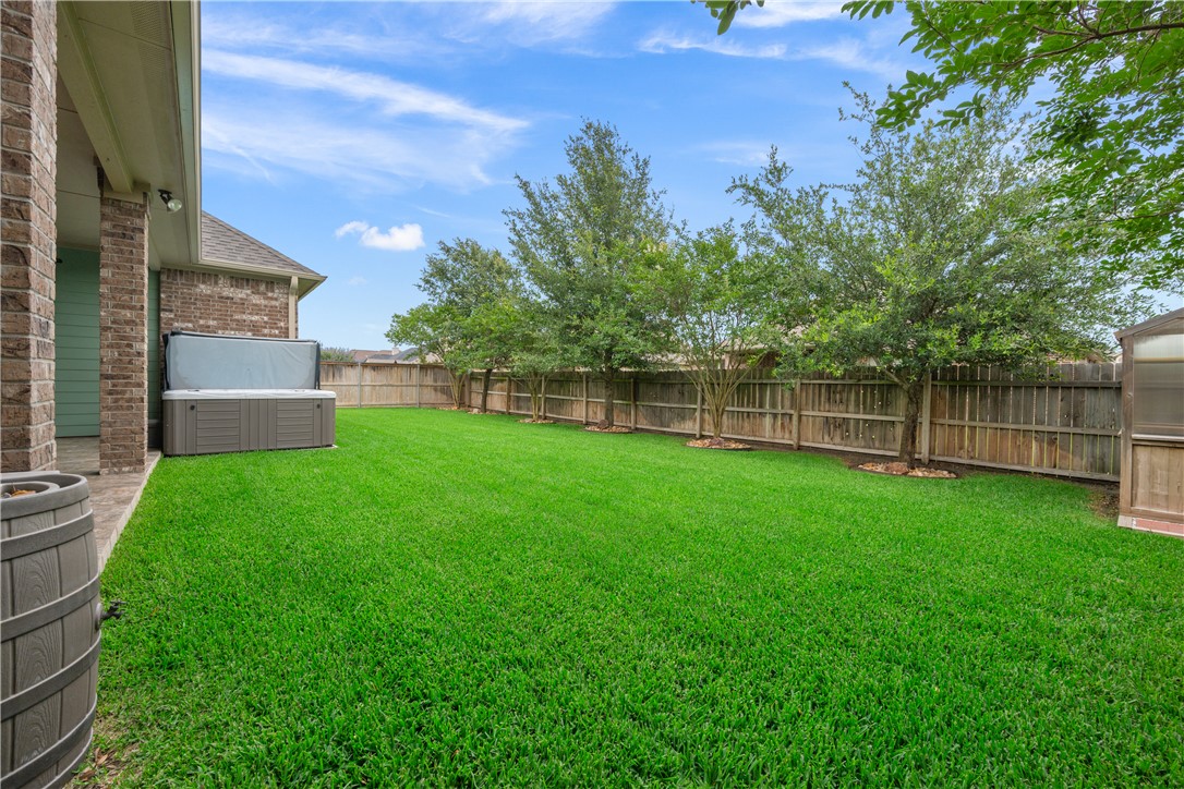 3085 Archer Circle Bryan, TX 77808 - Photo 28 of 31 a view of a backyard with a garden