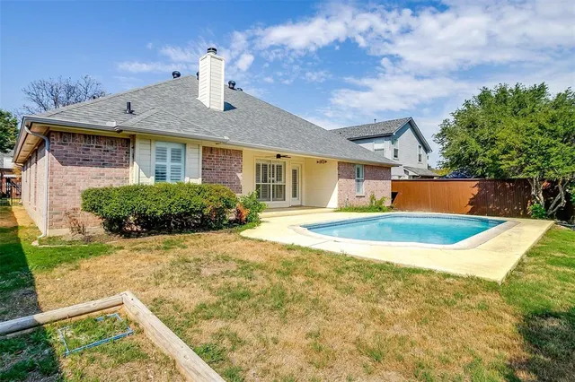 a front view of a house with yard