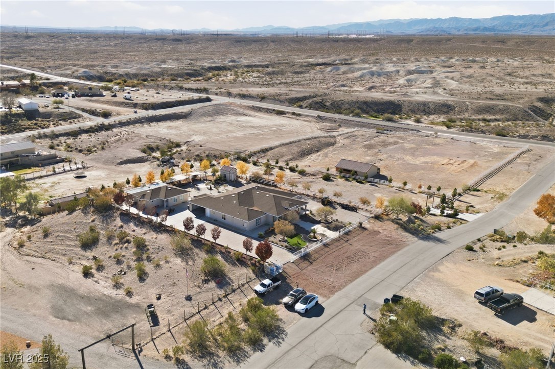 1285 Embry Avenue Moapa, NV 89025 - Photo 2 of 98 Aerial overview of property's location with rural landscape