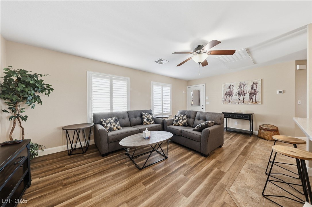 1285 Embry Avenue Moapa, NV 89025 - Photo 59 of 98 Living room with light wood-style flooring and ceiling fan