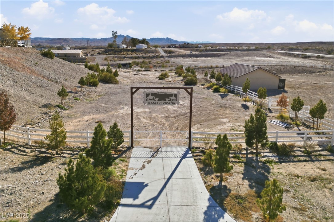 1285 Embry Avenue Moapa, NV 89025 - Photo 8 of 98 Aerial view of sparsely populated area with a mountain backdrop