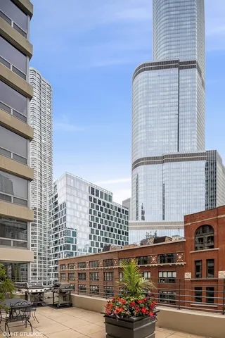 a front view of a building with outdoor space