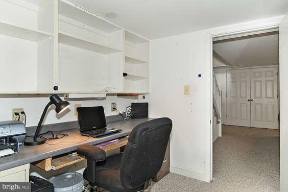 327 Whitfield Road Baltimore, MD 21228 - Photo 22 of 25 a workspace with a desk and chair