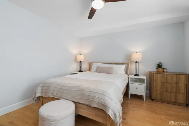 a bedroom with a bed and a cabinets