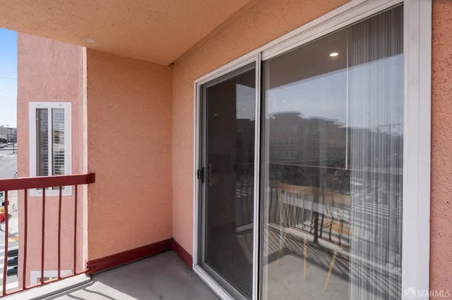a view of a bathroom with a glass door