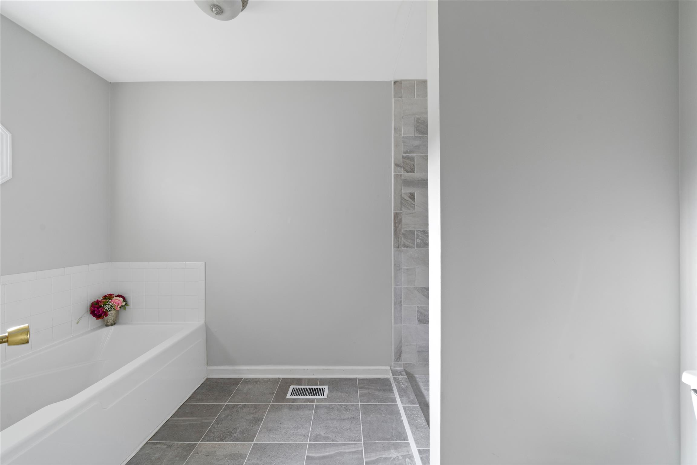 5075 Highpoint Road Pleasant View, TN 37146 - Photo 18 of 29 New Tile Throughout bathroom