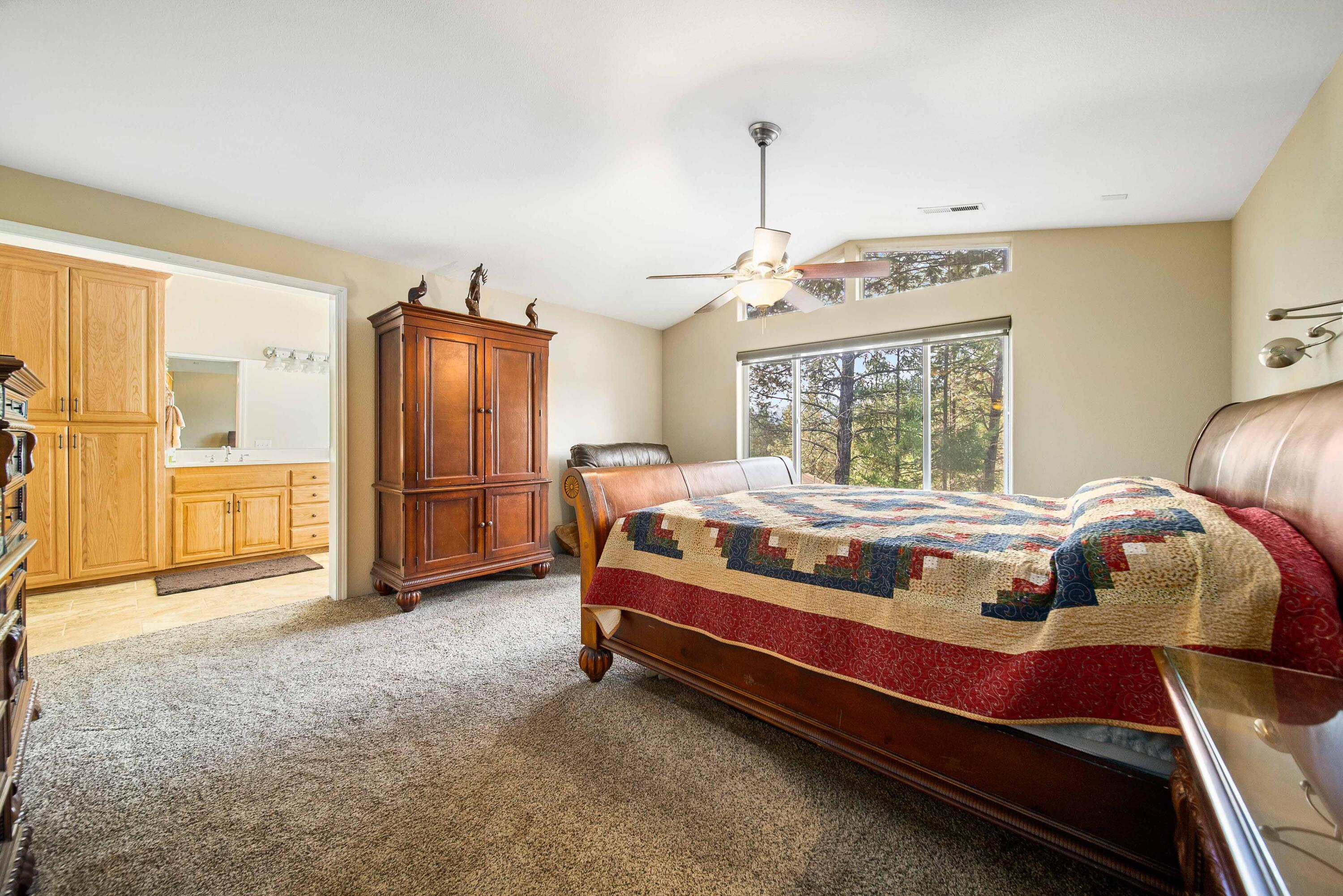 1280 Crow Road Merlin, OR 97532 - Photo 14 of 44 a bedroom with bed and window