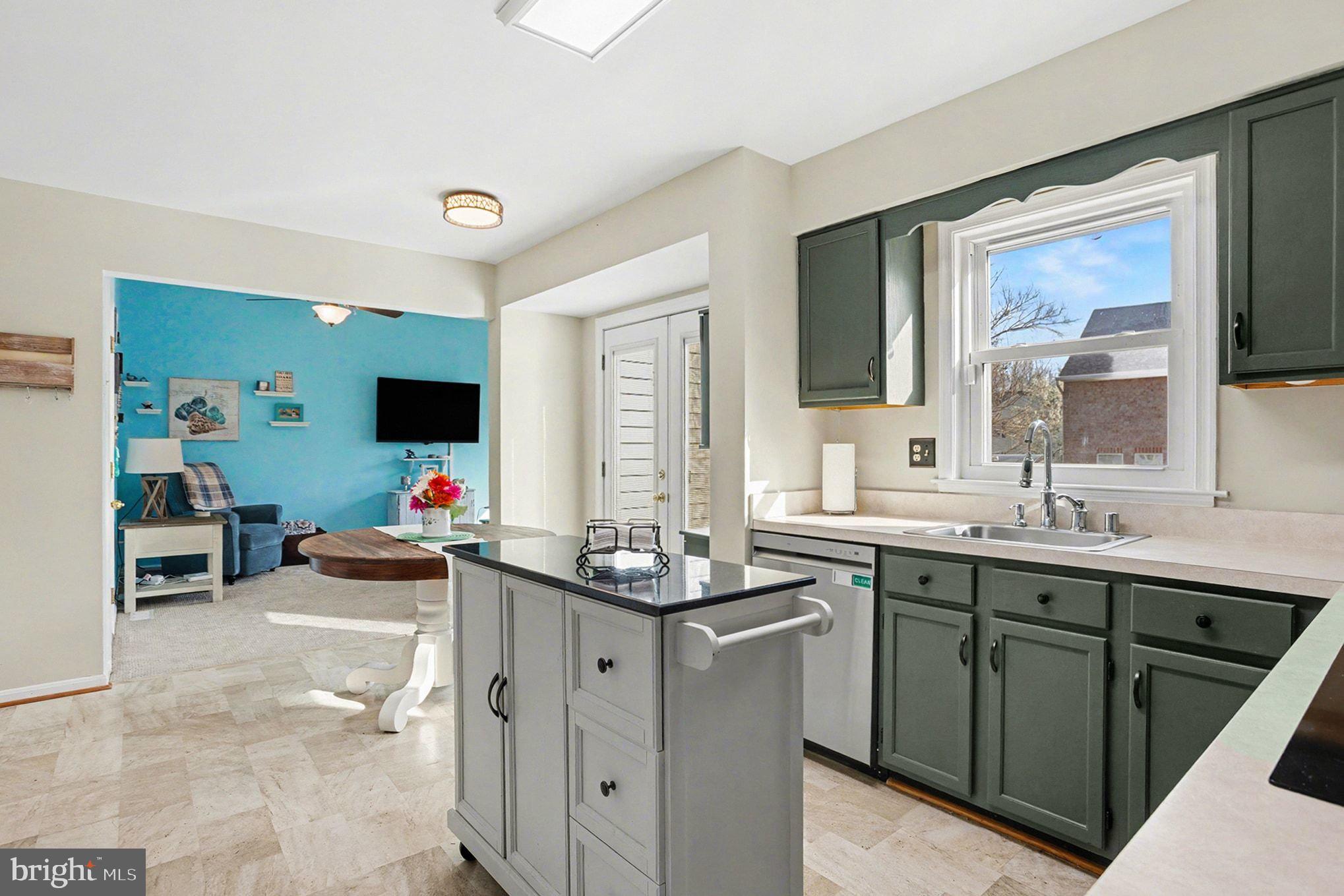 4400 Cottington Road Nottingham, MD 21236 - Photo 10 of 48 a kitchen that has a sink and a stove in it