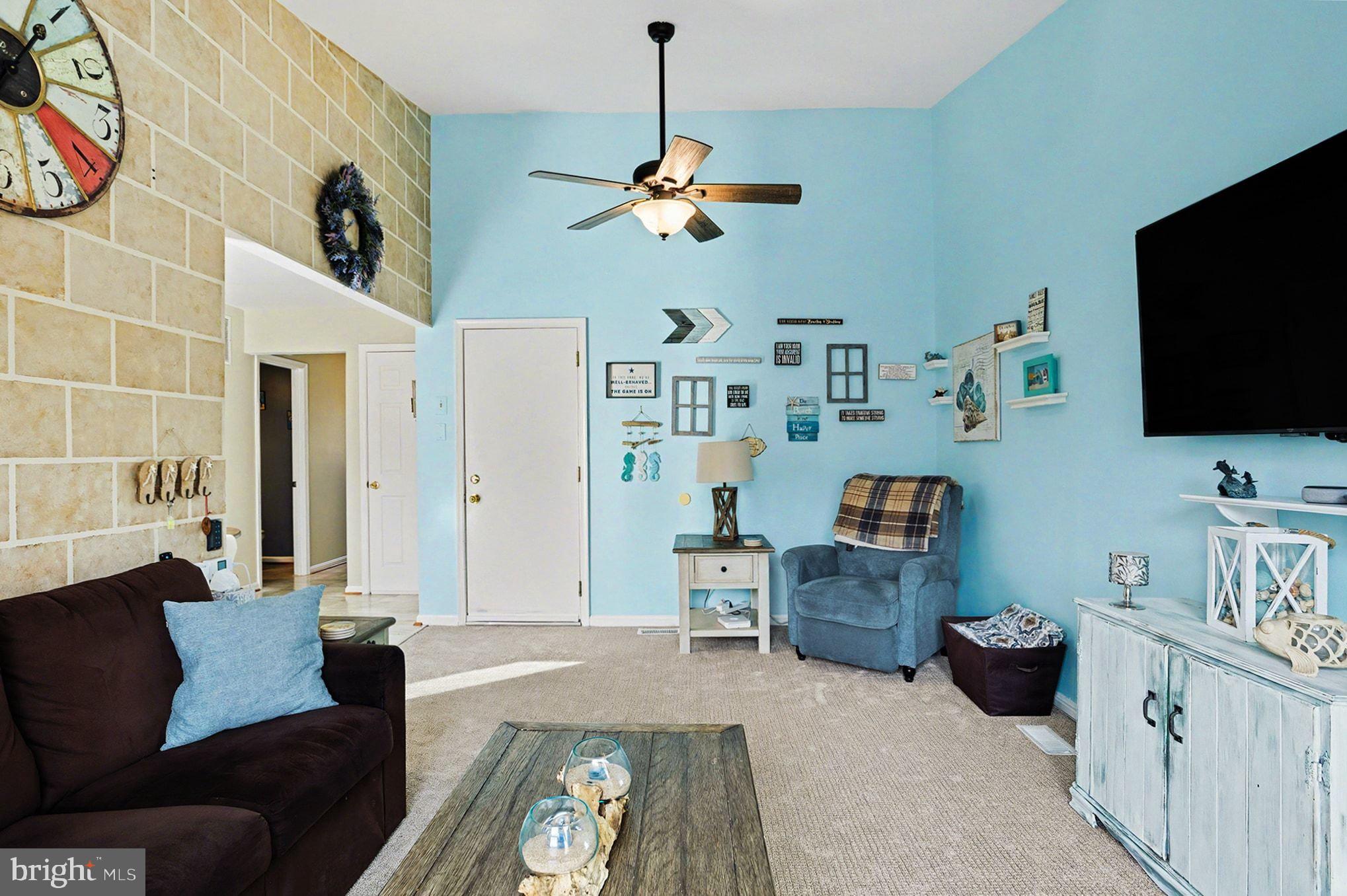 4400 Cottington Road Nottingham, MD 21236 - Photo 18 of 48 a living room with furniture and a flat screen tv