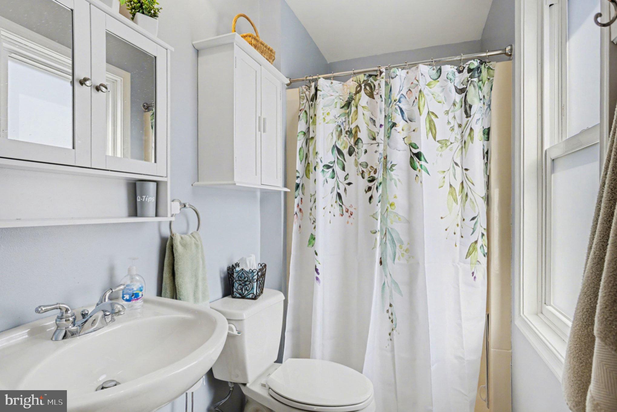 4400 Cottington Road Nottingham, MD 21236 - Photo 23 of 48 a bathroom with a sink toilet and shower