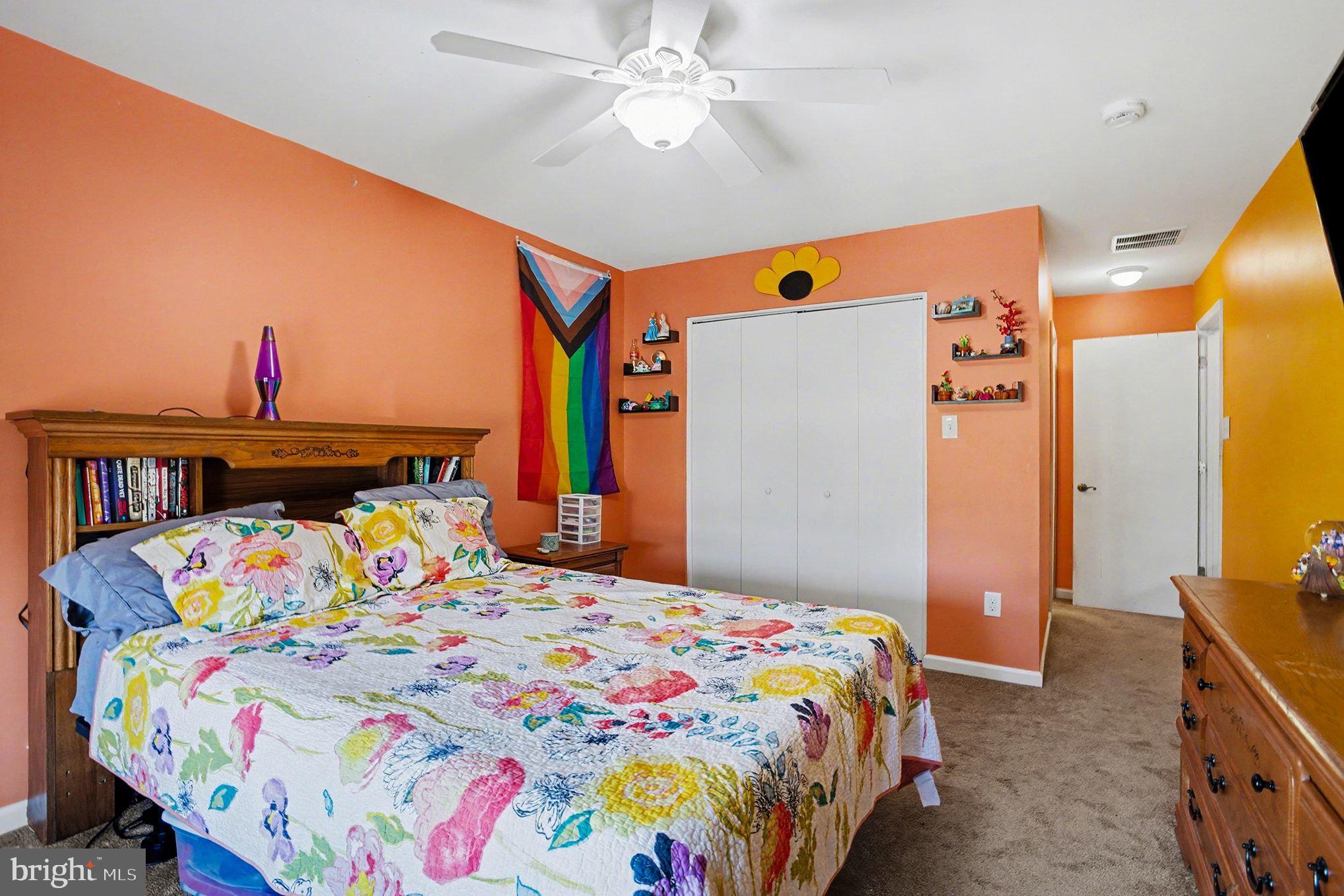 4400 Cottington Road Nottingham, MD 21236 - Photo 25 of 48 a bedroom with a bed and a chandelier