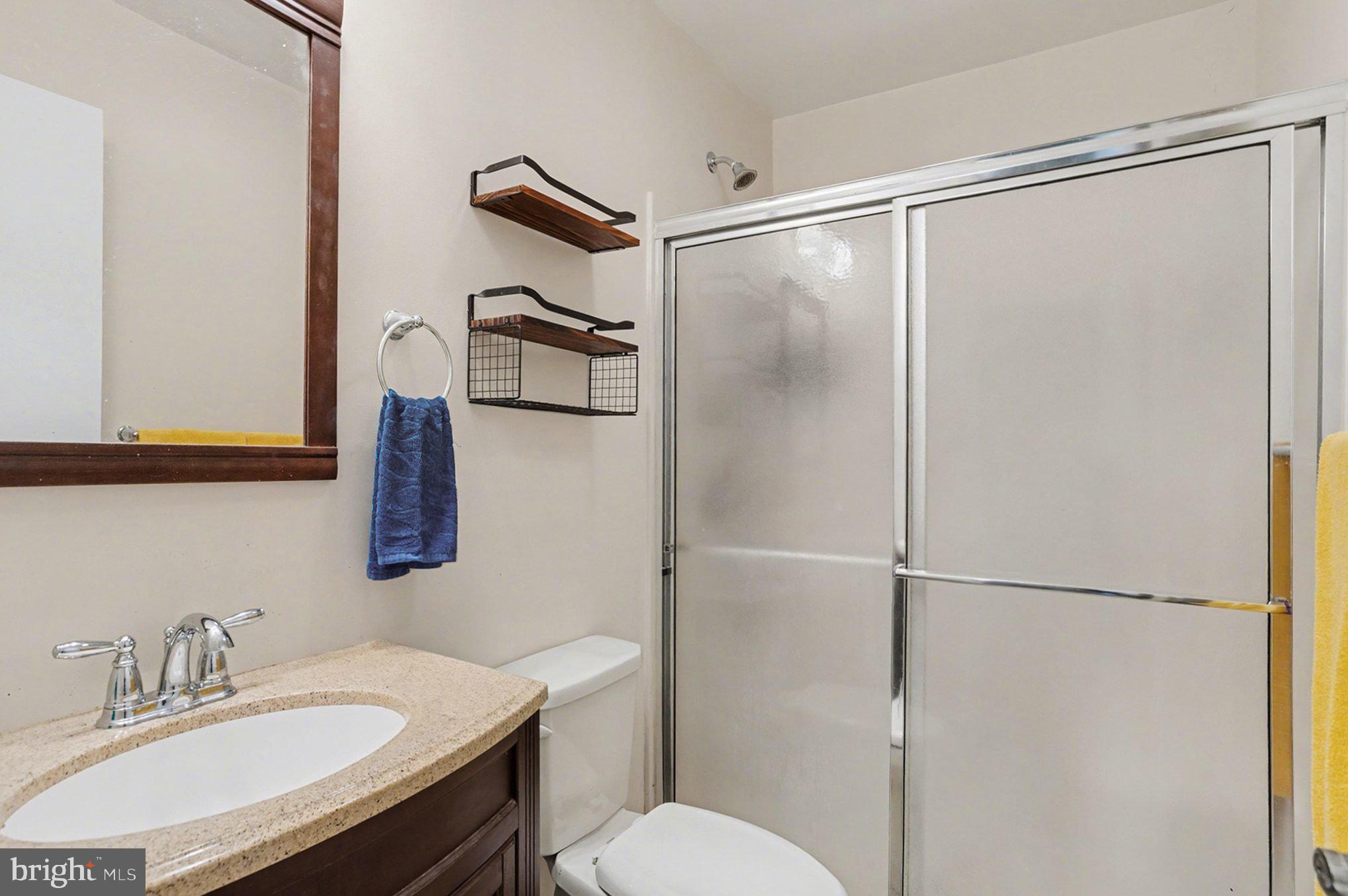 4400 Cottington Road Nottingham, MD 21236 - Photo 26 of 48 a bathroom with a sink toilet and shower