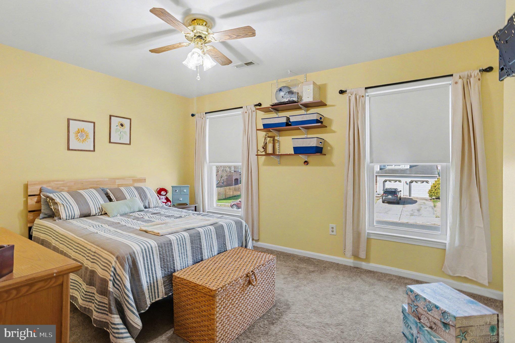 4400 Cottington Road Nottingham, MD 21236 - Photo 27 of 48 a bedroom with a bed and a window