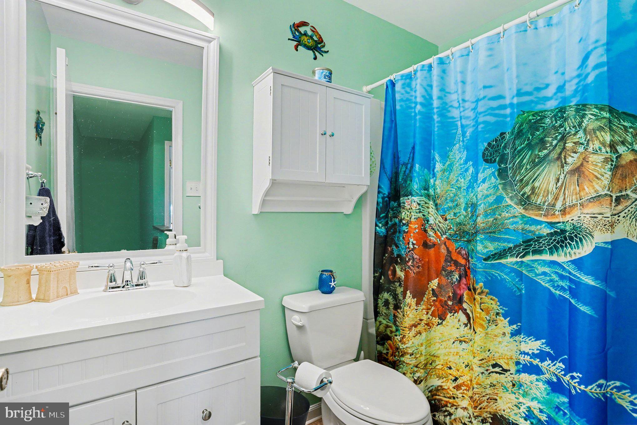 4400 Cottington Road Nottingham, MD 21236 - Photo 31 of 48 a bathroom with a toilet sink and mirror