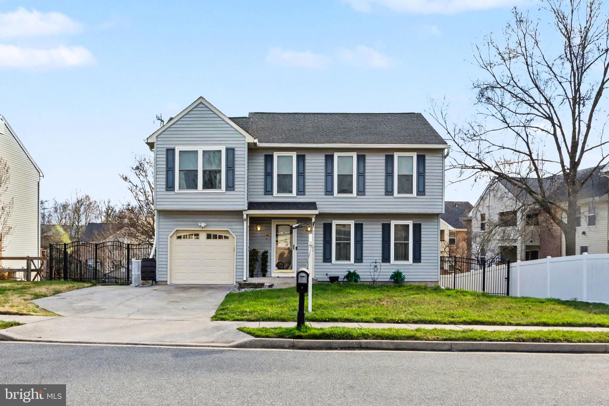 4400 Cottington Road Nottingham, MD 21236 - Photo 45 of 48 a front view of a house with a garden